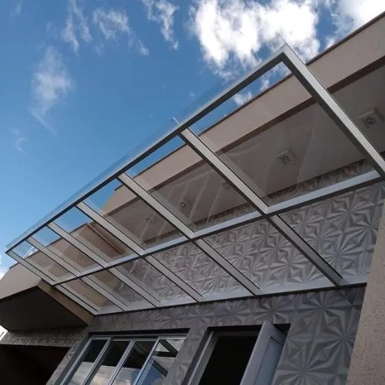 Toldo Fixo Policarbonato Compacto em Capela, Mogi Guaçu SP Toldo Fixo Policarbonato Compacto em Capela, Mogi Guaçu SP — Cobertura com estrutura metálica reforçada